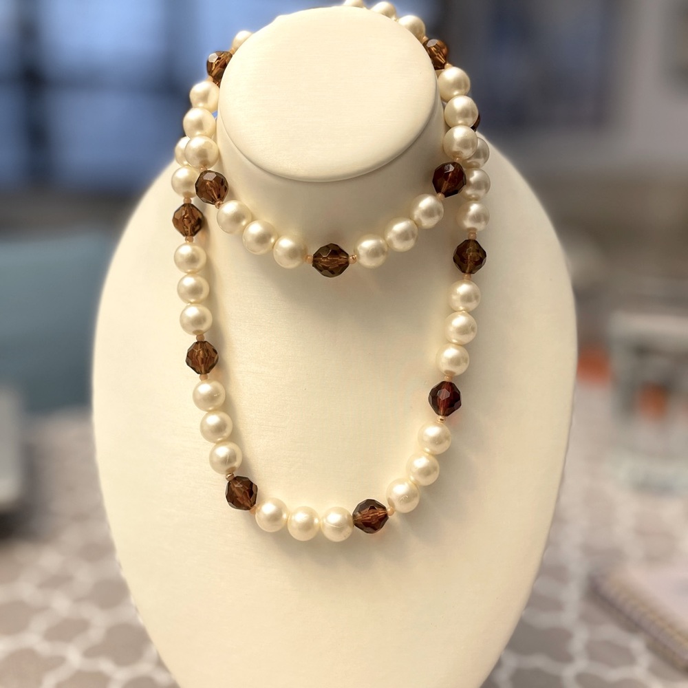 Classic 90s fashion jewelry.  Faux pearls w amber-color beads.